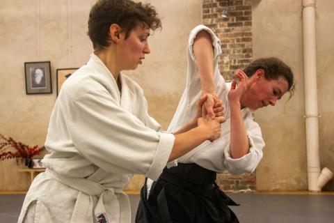 Pratiquantes d'Aikido dans le dojo Tenchi