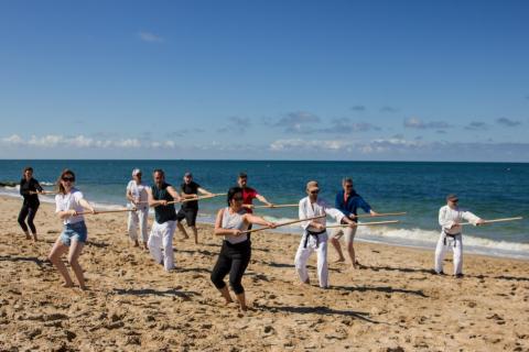 Pratiquant·es sur la plage